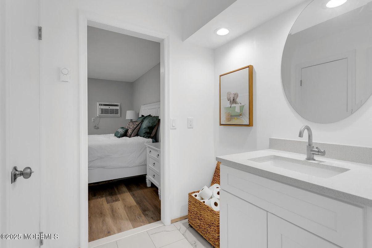 Bathroom, Bedroom, Dual Sink Vanities, Interior, Recessed Lighting, Wood Texture Flooring
