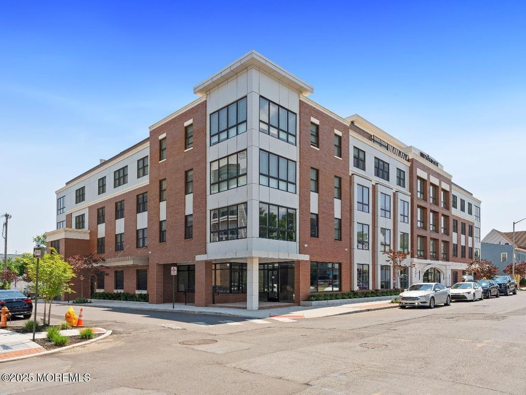 Exterior, Facade, Brick Facade, Condo Building