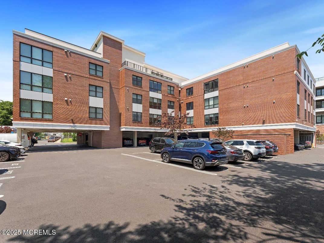 Exterior, Facade, Brick Facade, Condo Building