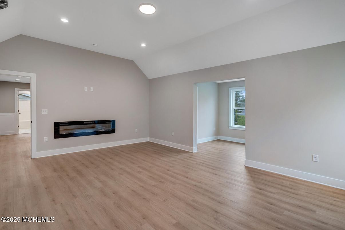 Empty room, Fireplace, Interior, Recessed Lighting, Wood Texture Flooring