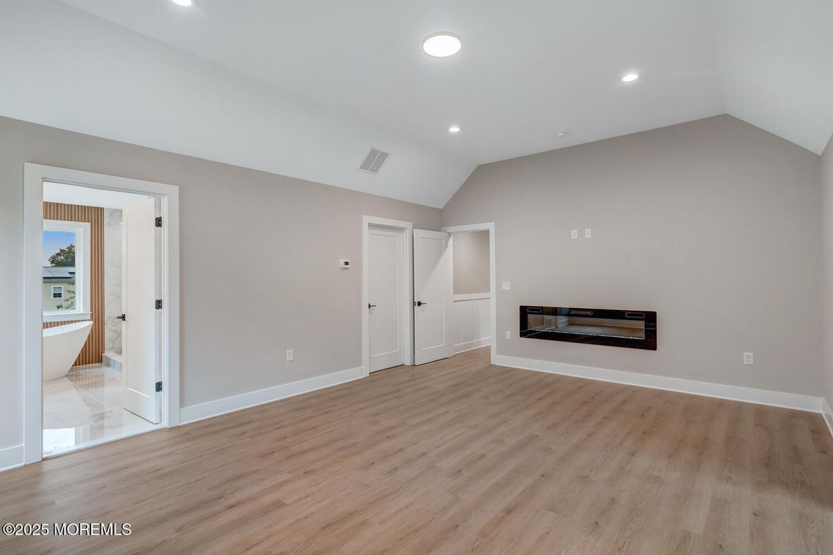 Empty room, Fireplace, Interior, Recessed Lighting, Wood Texture Flooring