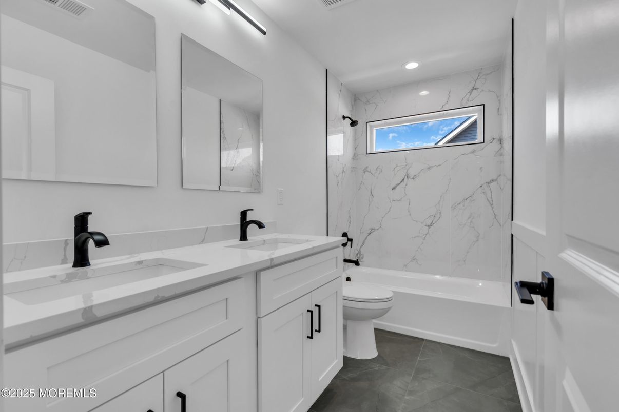 Bathroom, Dual Sink Vanities, Interior, Marble Walls, Recessed Lighting