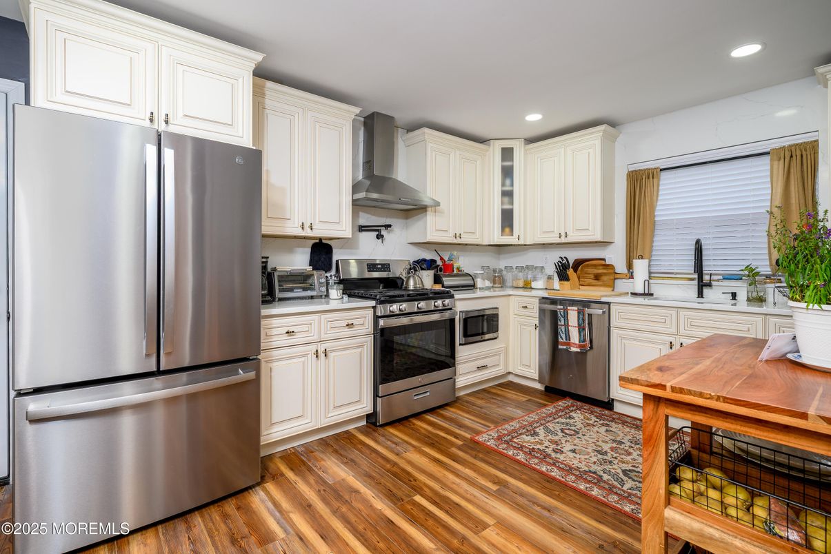 Interior, Kitchen, Recessed Lighting, Stainless Steel Appliances, Wood Texture Flooring