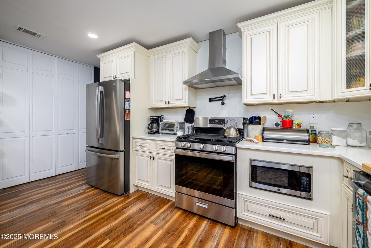 Interior, Kitchen, Recessed Lighting, Stainless Steel Appliances, Wood Texture Flooring