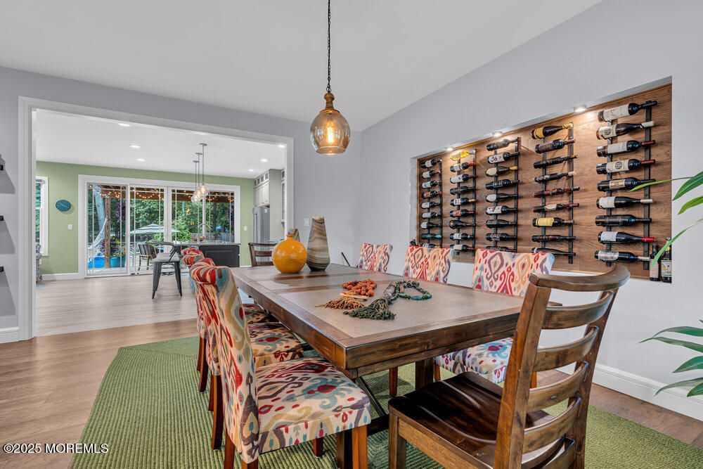 Dining room, Interior, Pendant Lights, Recessed Lighting, Wine Storage, Wood Texture Flooring