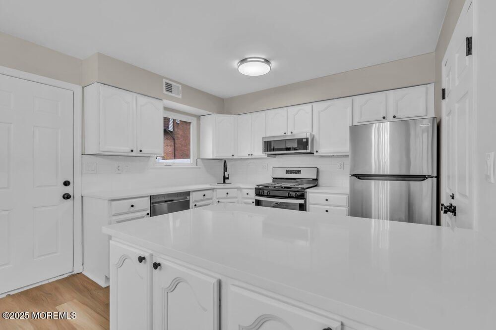 Interior, Kitchen, Stainless Steel Appliances, Wood Texture Flooring