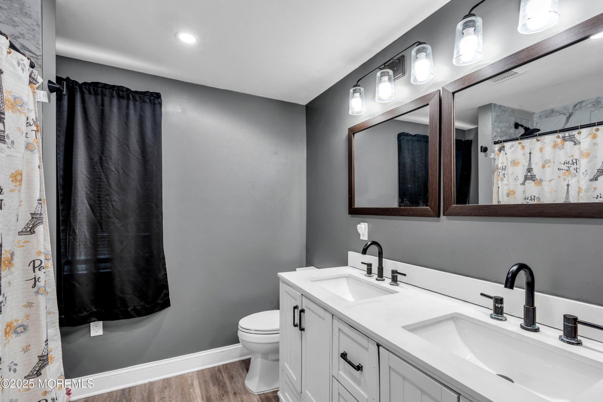 Bathroom, Dual Sink Vanities, Interior, Recessed Lighting, Wood Texture Flooring