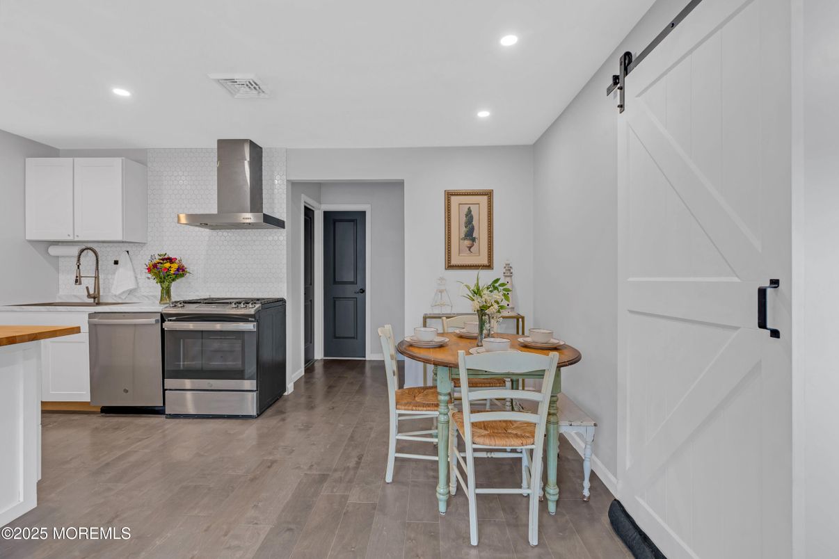 Dining room, Interior, Kitchen, Recessed Lighting, Stainless Steel Appliances, Wood Texture Flooring