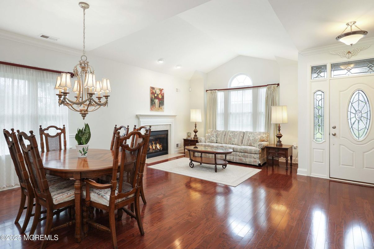 Chandelier, Dining room, Fireplace, Interior, Living room, Recessed Lighting, Wood Texture Flooring