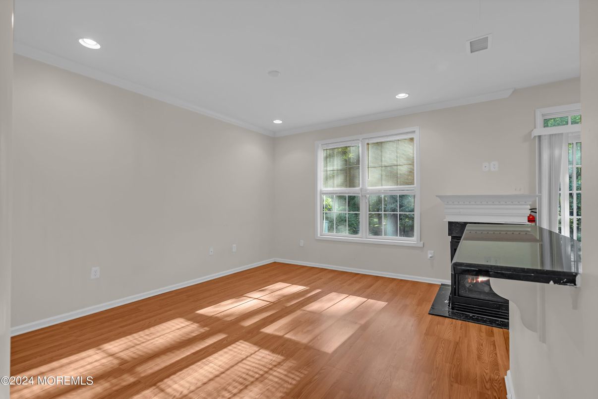 Empty room, Fireplace, Interior, Recessed Lighting, Wood Texture Flooring
