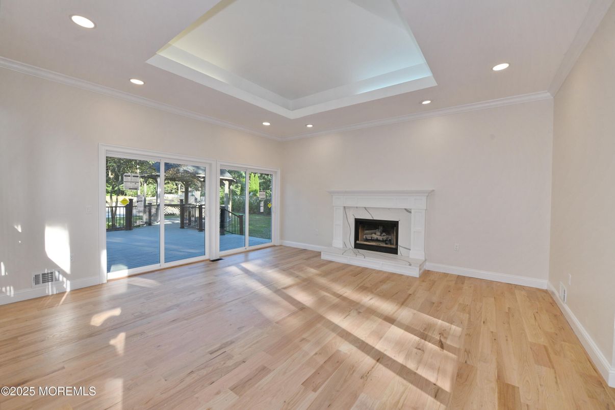 Empty room, Fireplace, Interior, Recessed Lighting, Wood Texture Flooring