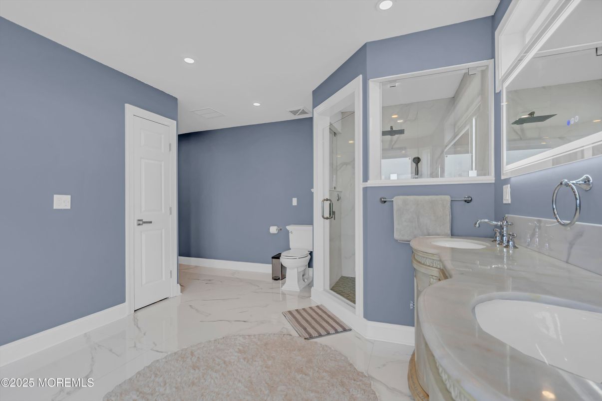 Bathroom, Dual Sink Vanities, Glass Shower, Interior, Marble, Recessed Lighting
