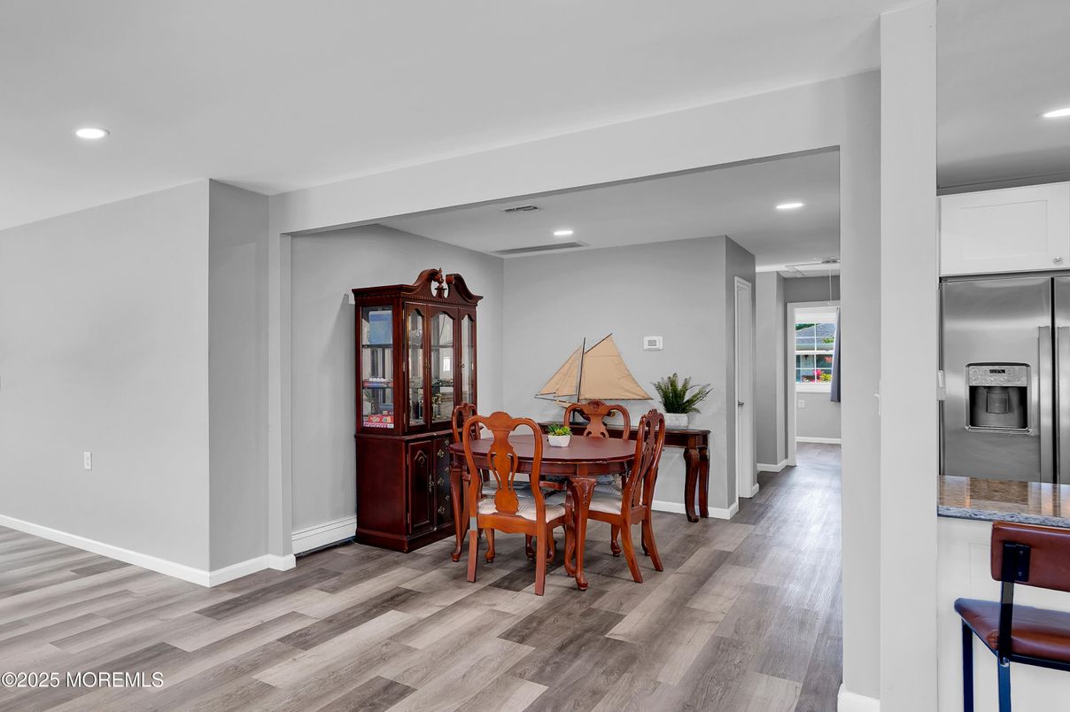 Dining room, Interior, Recessed Lighting, Stainless Steel Appliances, Wood Texture Flooring
