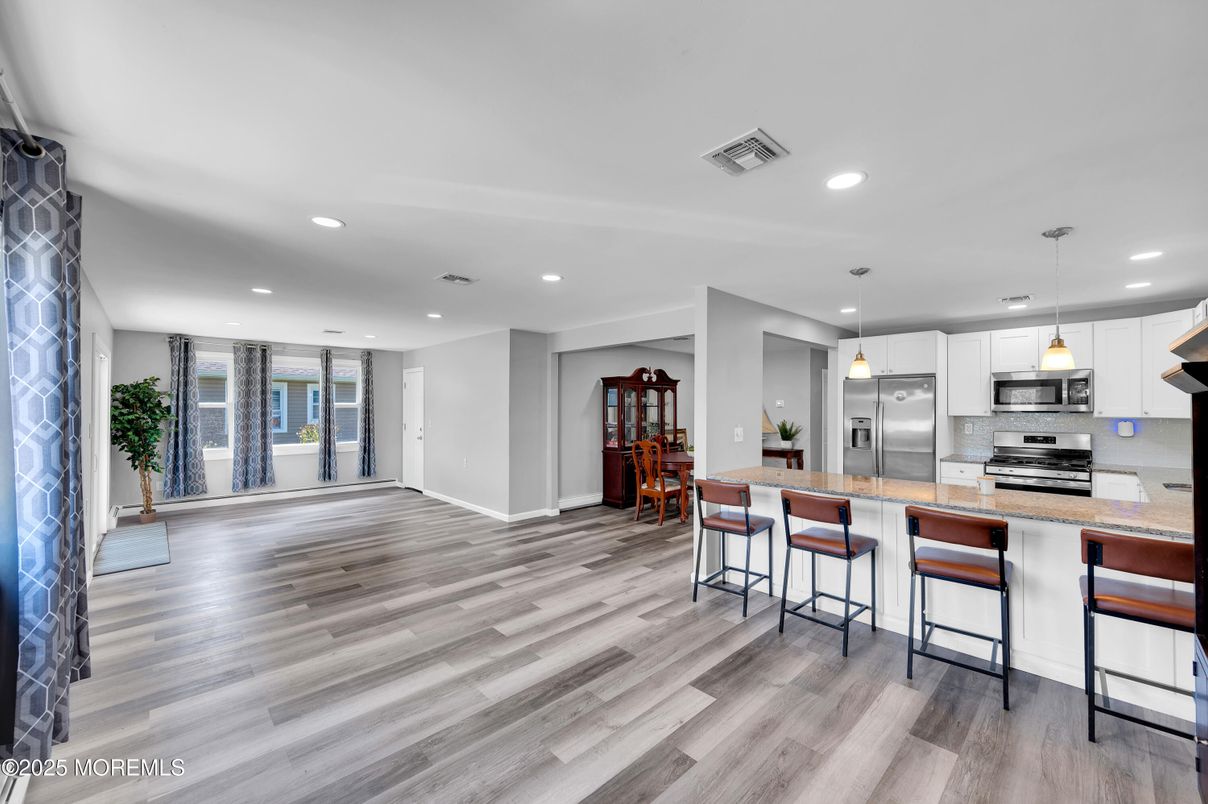 Interior, Kitchen, Pendant Lights, Recessed Lighting, Stainless Steel Appliances, Wood Texture Flooring