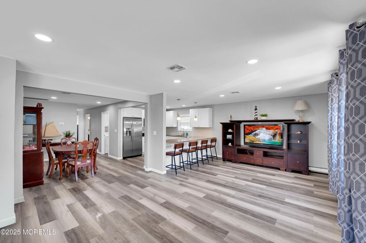 Dining room, Interior, Kitchen, Recessed Lighting, Stainless Steel Appliances, Wood Texture Flooring
