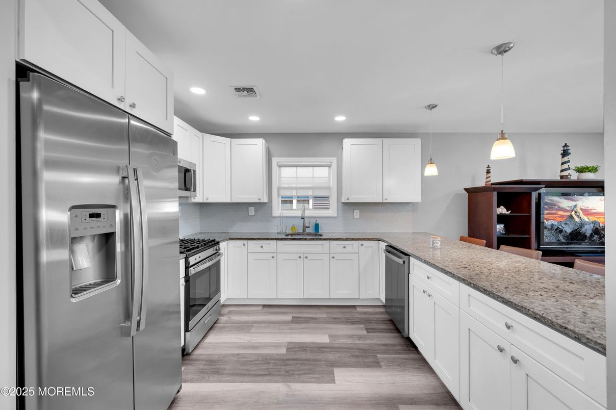Interior, Kitchen, Pendant Lights, Recessed Lighting, Stainless Steel Appliances, Wood Texture Flooring