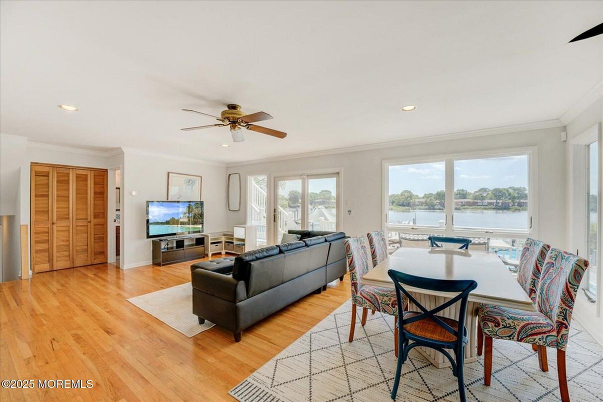 Dining room, Interior, Living room, Recessed Lighting, Water, Wood Texture Flooring