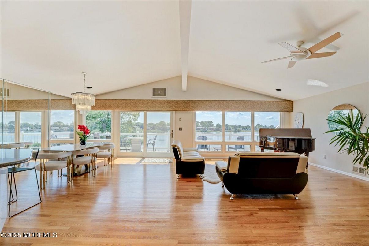 Chandelier, Dining room, Interior, Living room, Piano, Water, Wood Texture Flooring