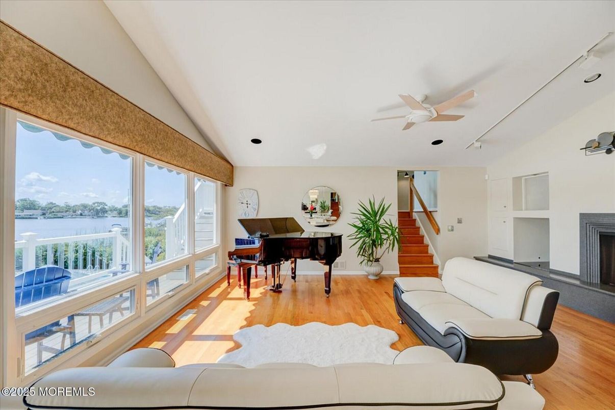 Fireplace, Interior, Living room, Piano, Water, Wood Texture Flooring