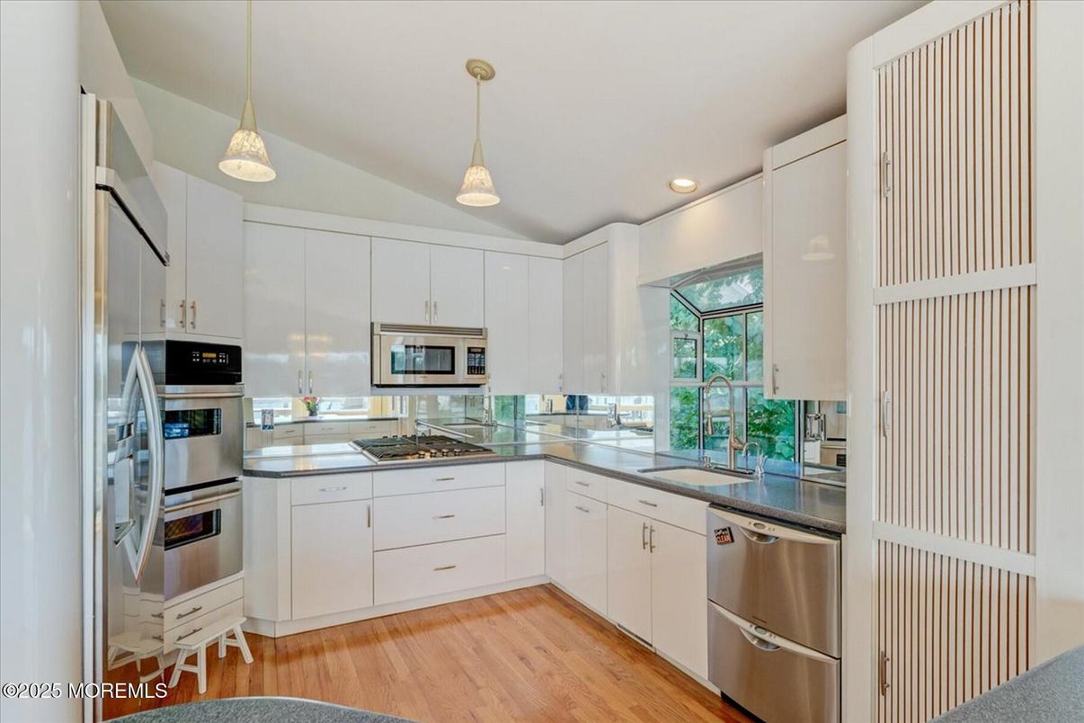 Interior, Kitchen, Pendant Lights, Recessed Lighting, Stainless Steel Appliances, Wood Texture Flooring