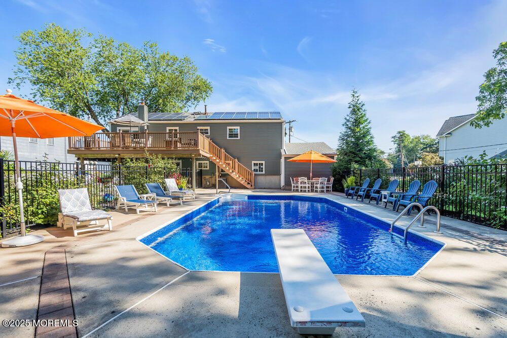 Exterior, Pool, Solar Panels