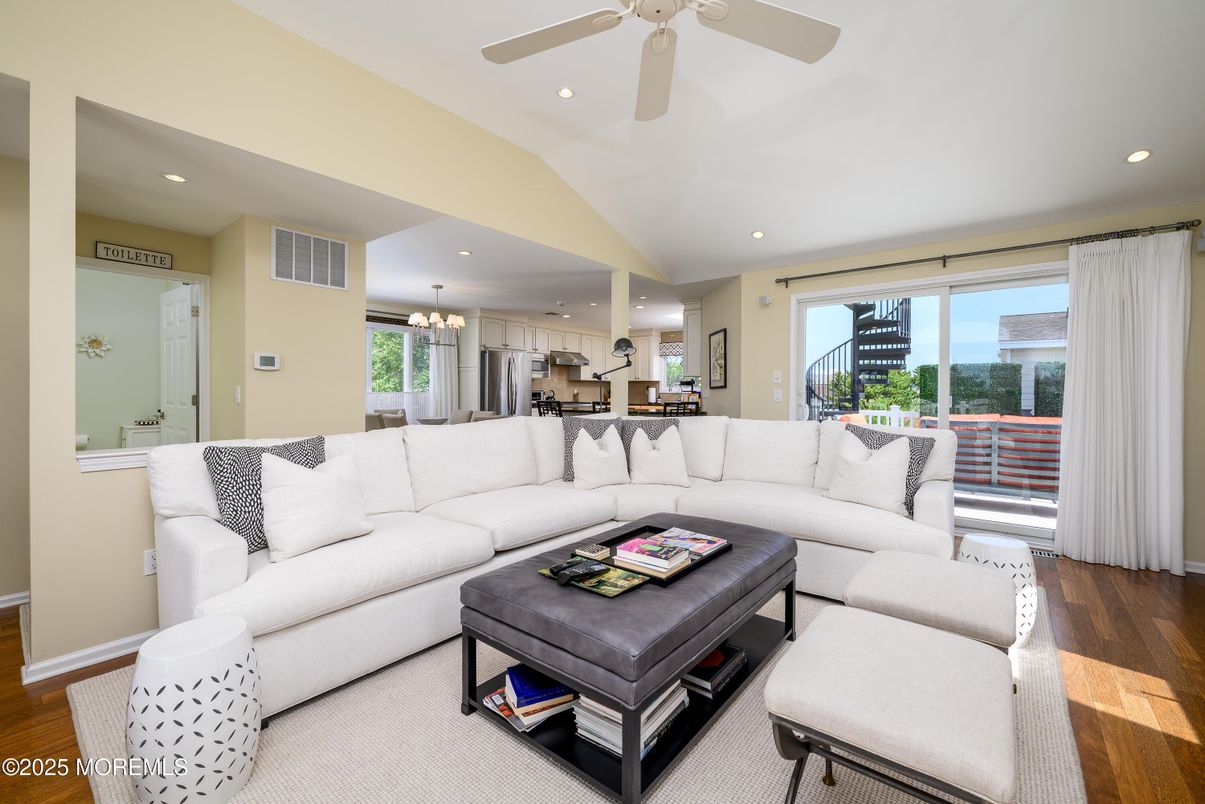 Chandelier, Dining room, Interior, Kitchen, Living room, Recessed Lighting, Stainless Steel Appliances, Wood Texture Flooring