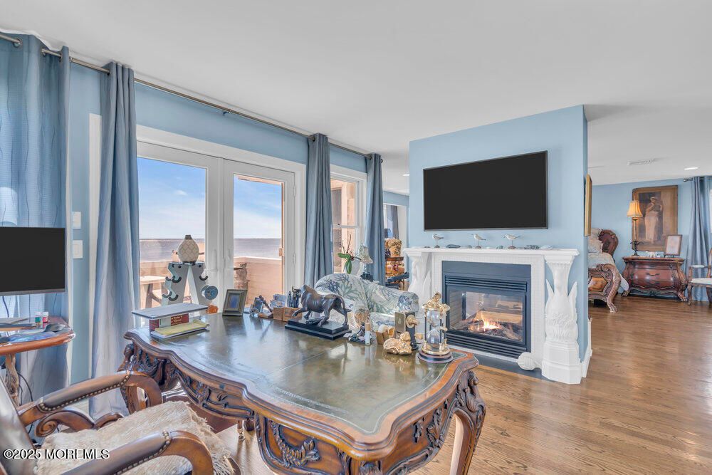 Dining room, Fireplace, Interior, Recessed Lighting, Water, Wood Texture Flooring