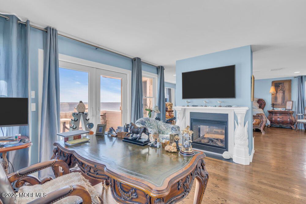 Dining room, Fireplace, Interior, Recessed Lighting, Water, Wood Texture Flooring