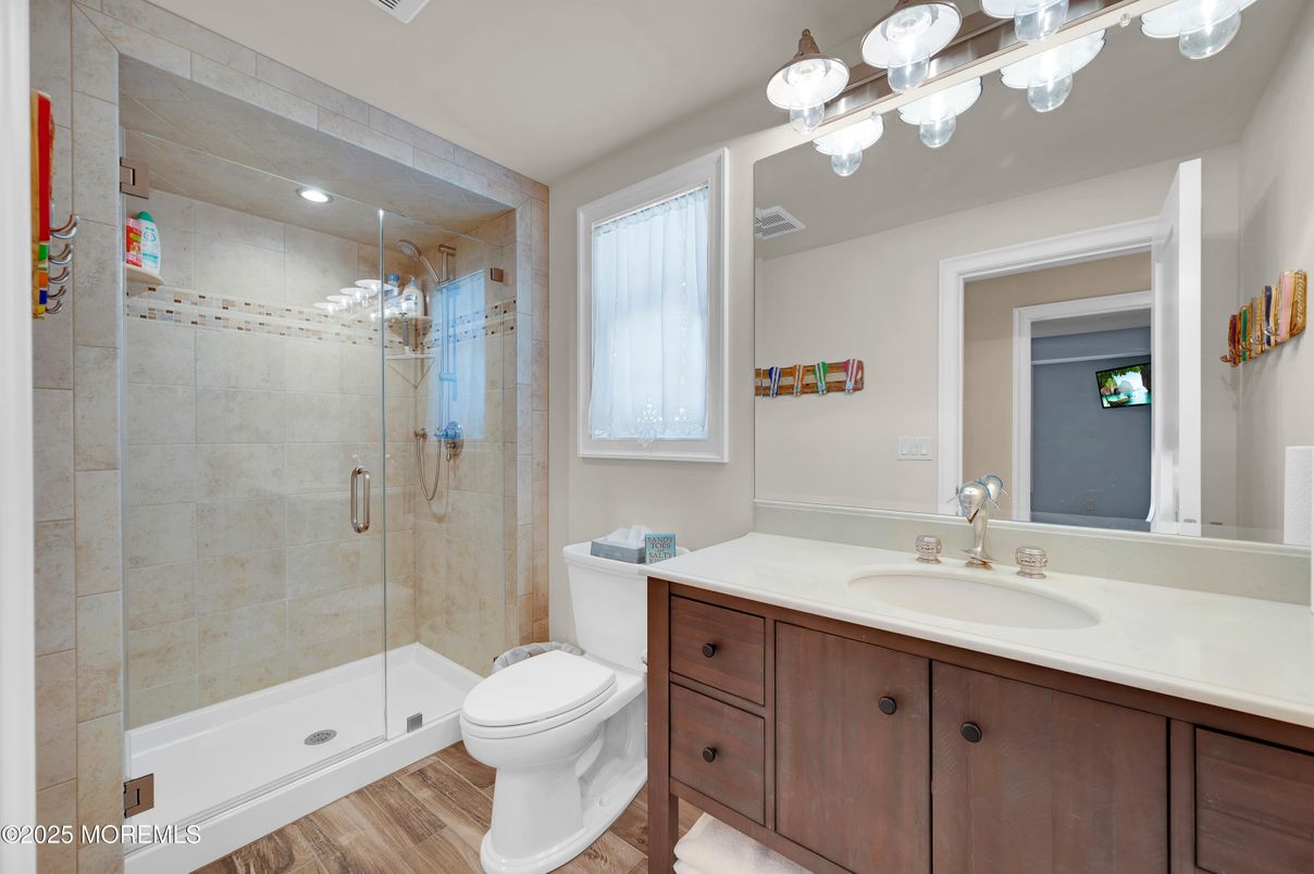 Bathroom, Glass Shower, Interior, Recessed Lighting, Wood Texture Flooring