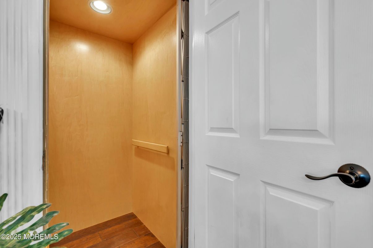 Elevator, Interior, Recessed Lighting, Wood Texture Flooring, Wooden Walls