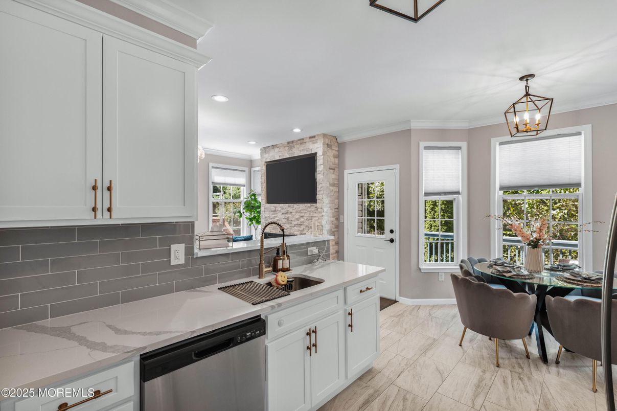 Dining room, Interior, Kitchen, Marble, Pendant Lights, Recessed Lighting, Stainless Steel Appliances, Stone Walls