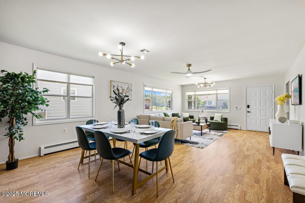 Dining room, Interior, Living room, Pendant Lights, Wood Texture Flooring