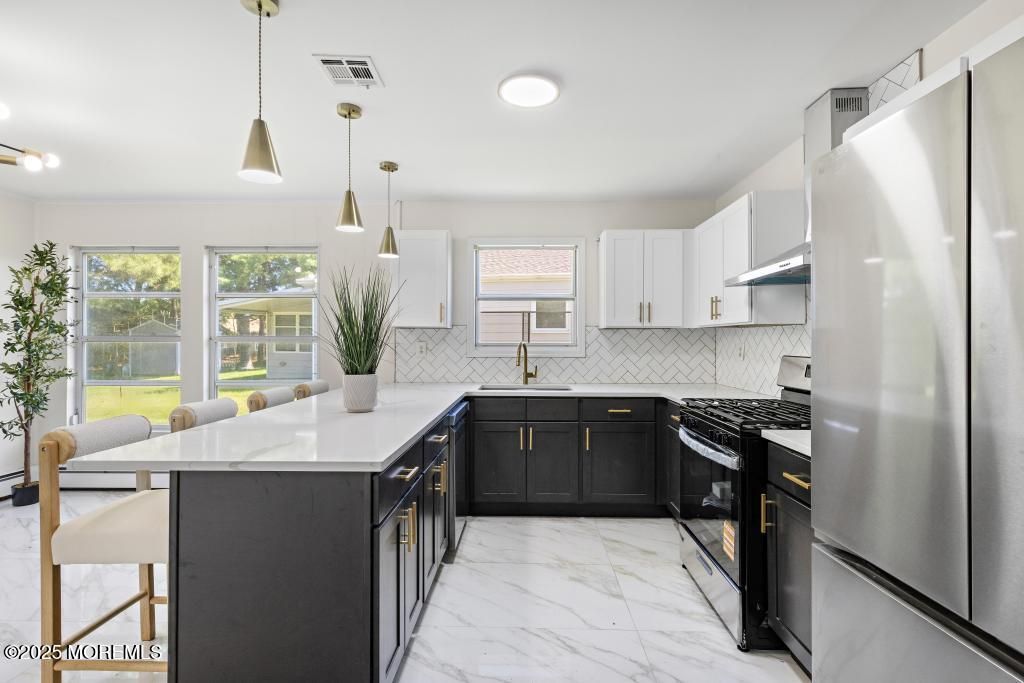 Interior, Kitchen, Marble, Pendant Lights, Recessed Lighting, Stainless Steel Appliances