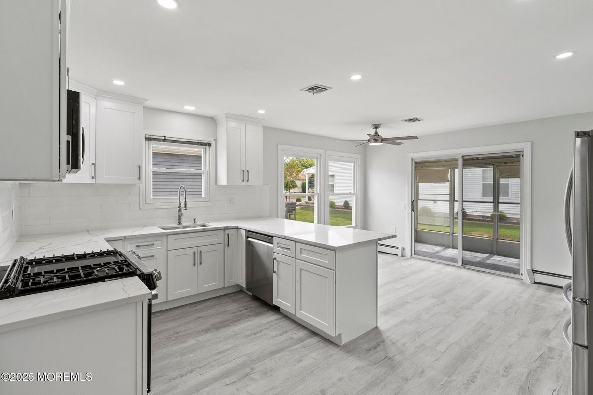 Interior, Kitchen, Recessed Lighting, Stainless Steel Appliances, Wood Texture Flooring