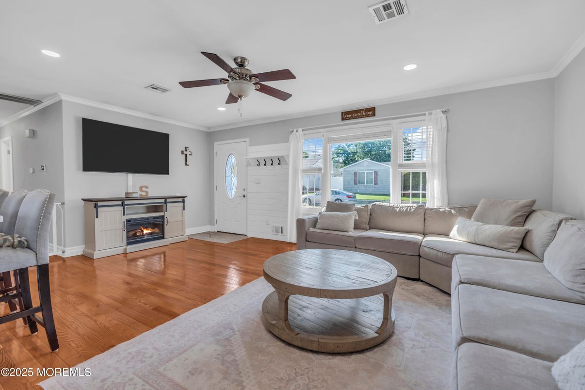 Fireplace, Interior, Living room, Recessed Lighting, Wood Texture Flooring