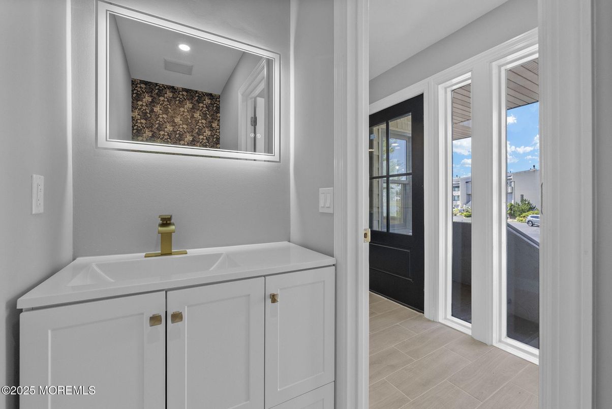 Bathroom, Dual Sink Vanities, Interior, Recessed Lighting, Wood Texture Flooring