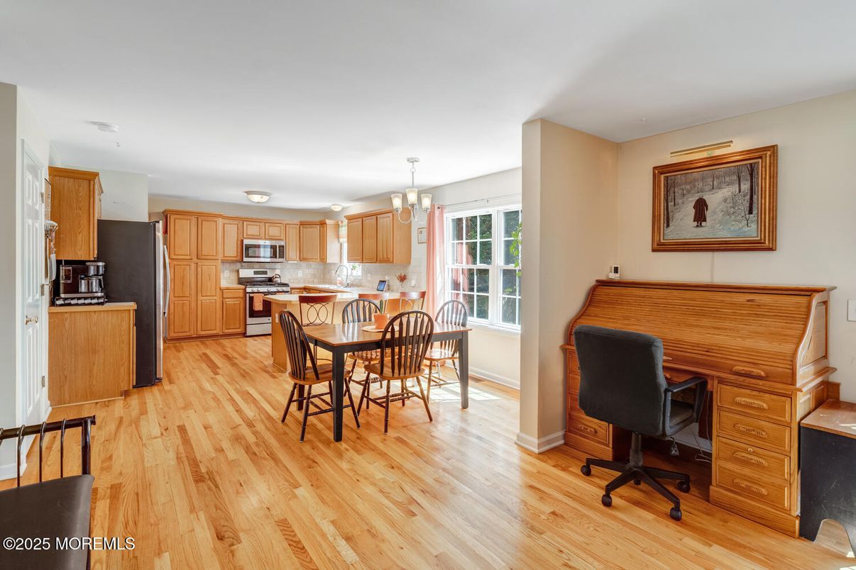 Chandelier, Dining room, Interior, Kitchen, Stainless Steel Appliances, Wood Texture Flooring