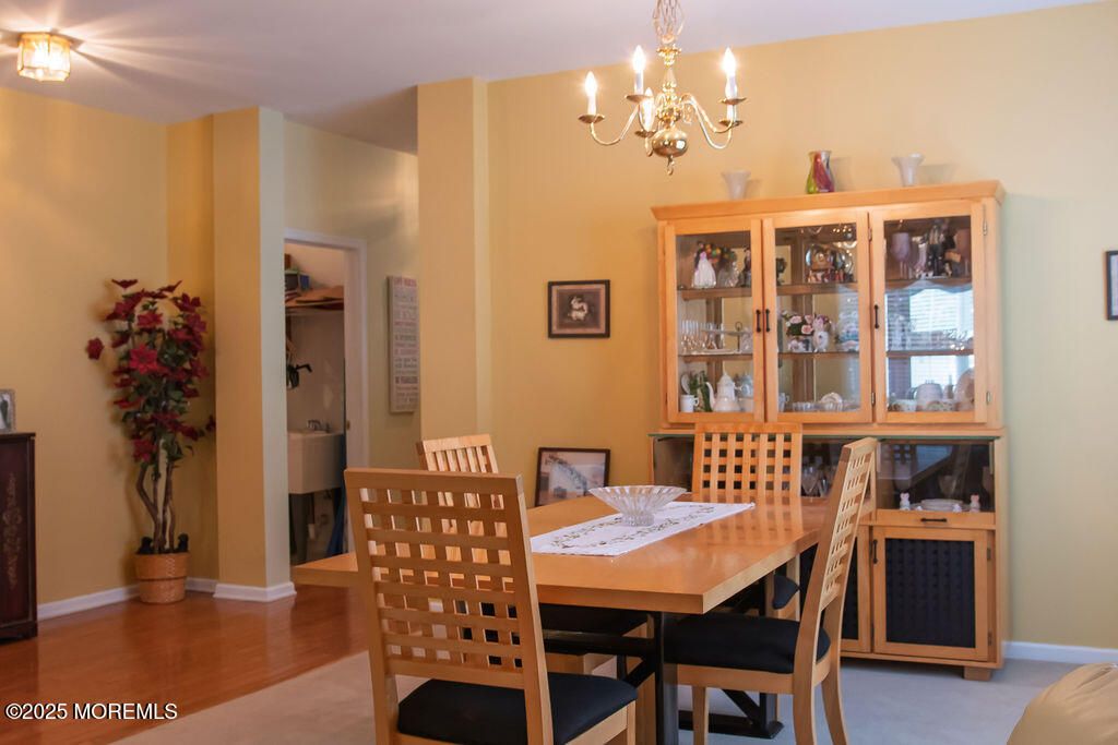 Chandelier, Dining room, Interior, Wood Texture Flooring
