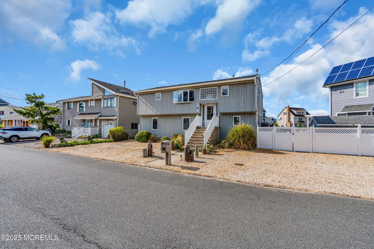 Exterior, Facade, Solar Panels, Raised Ranch