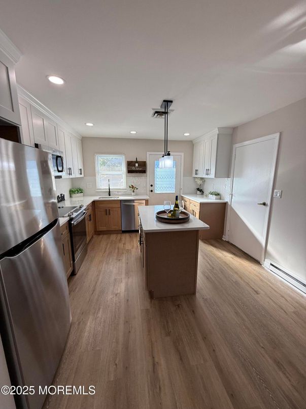 Interior, Kitchen, Pendant Lights, Recessed Lighting, Stainless Steel Appliances, Wood Texture Flooring