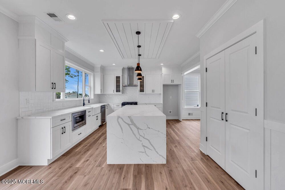 Interior, Kitchen, Pendant Lights, Recessed Lighting, Stainless Steel Appliances, Wood Texture Flooring