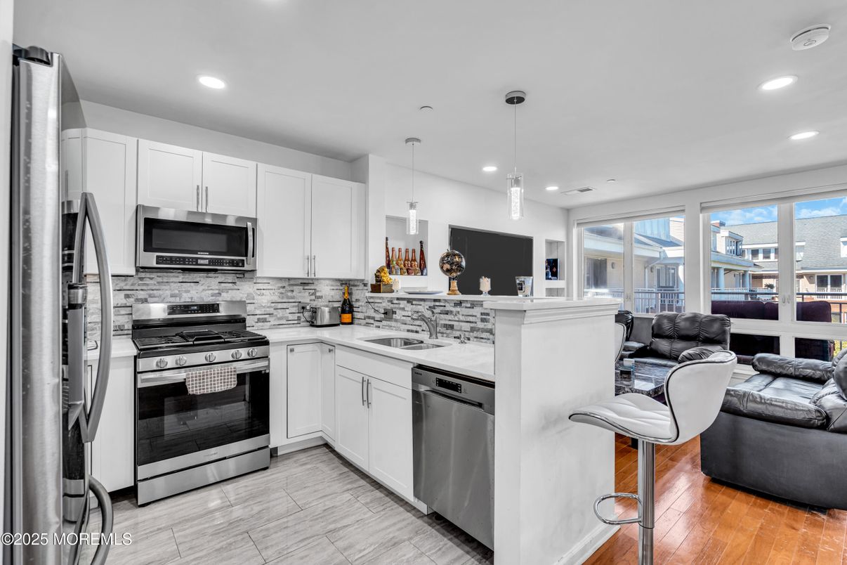 Interior, Kitchen, Pendant Lights, Recessed Lighting, Stainless Steel Appliances, Wood Texture Flooring