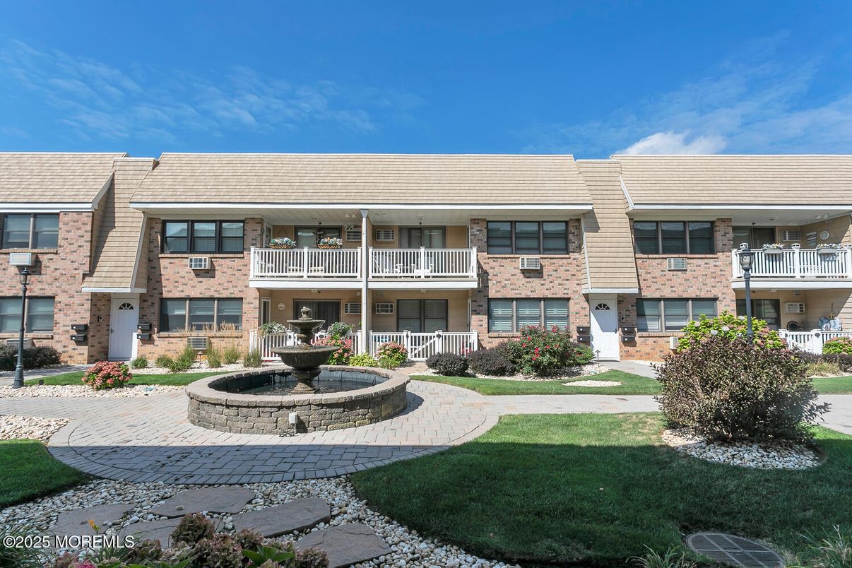 Exterior, Facade, Brick Facade, Condo Building