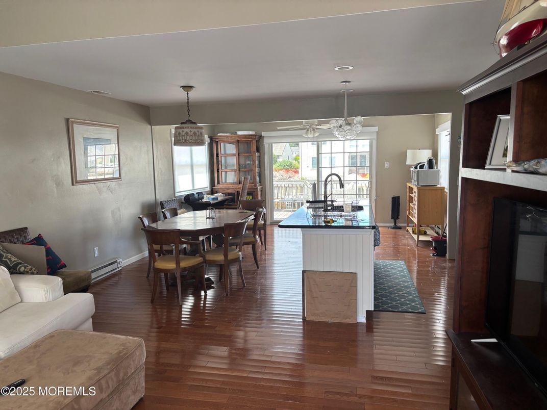 Chandelier, Dining room, Interior, Kitchen, Living room, Pendant Lights, Recessed Lighting, Wood Texture Flooring