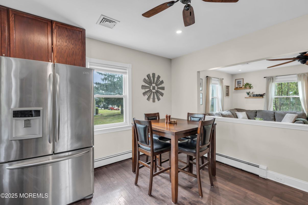 Dining room, Interior, Kitchen, Living room, Recessed Lighting, Stainless Steel Appliances, Wood Texture Flooring