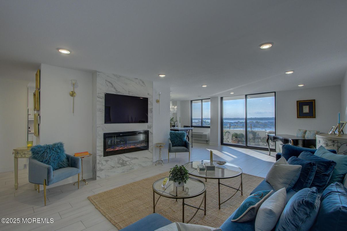 Fireplace, Interior, Living room, Marble, Marble Walls, Recessed Lighting, Water, Wood Texture Flooring