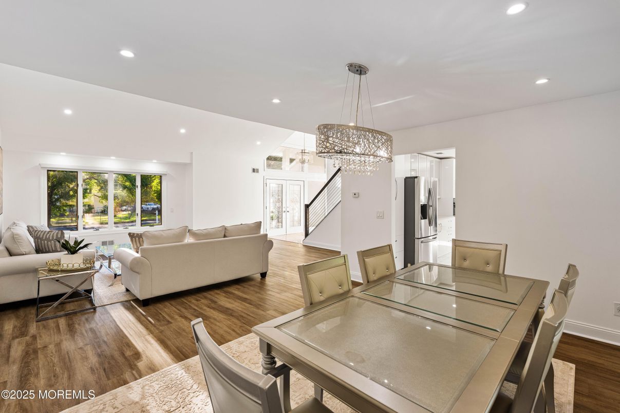 Dining room, Interior, Kitchen, Living room, Pendant Lights, Recessed Lighting, Stainless Steel Appliances, Wood Texture Flooring