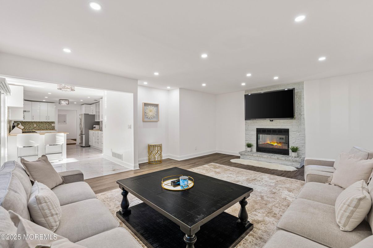 Fireplace, Interior, Kitchen, Living room, Recessed Lighting, Wood Texture Flooring