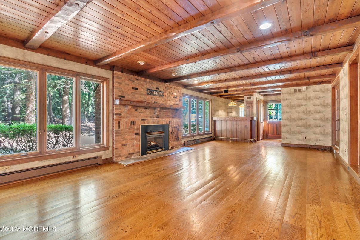 Empty room, Fireplace, Interior, Stone Walls, Wooden Beams, Wooden Ceilings, Wood Texture Flooring