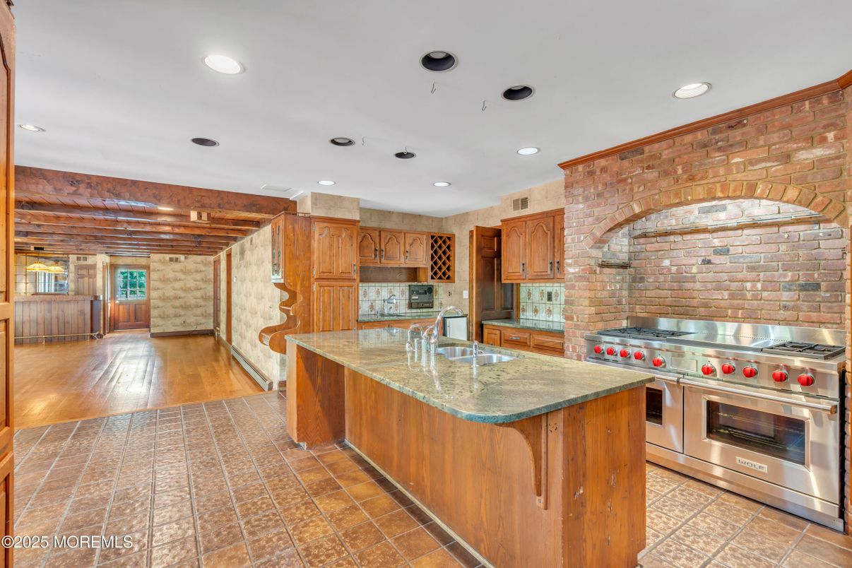 Interior, Kitchen, Recessed Lighting, Stainless Steel Appliances, Stone Walls, Wooden Beams, Wood Texture Flooring